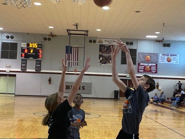 Indoor basketball game action shot
